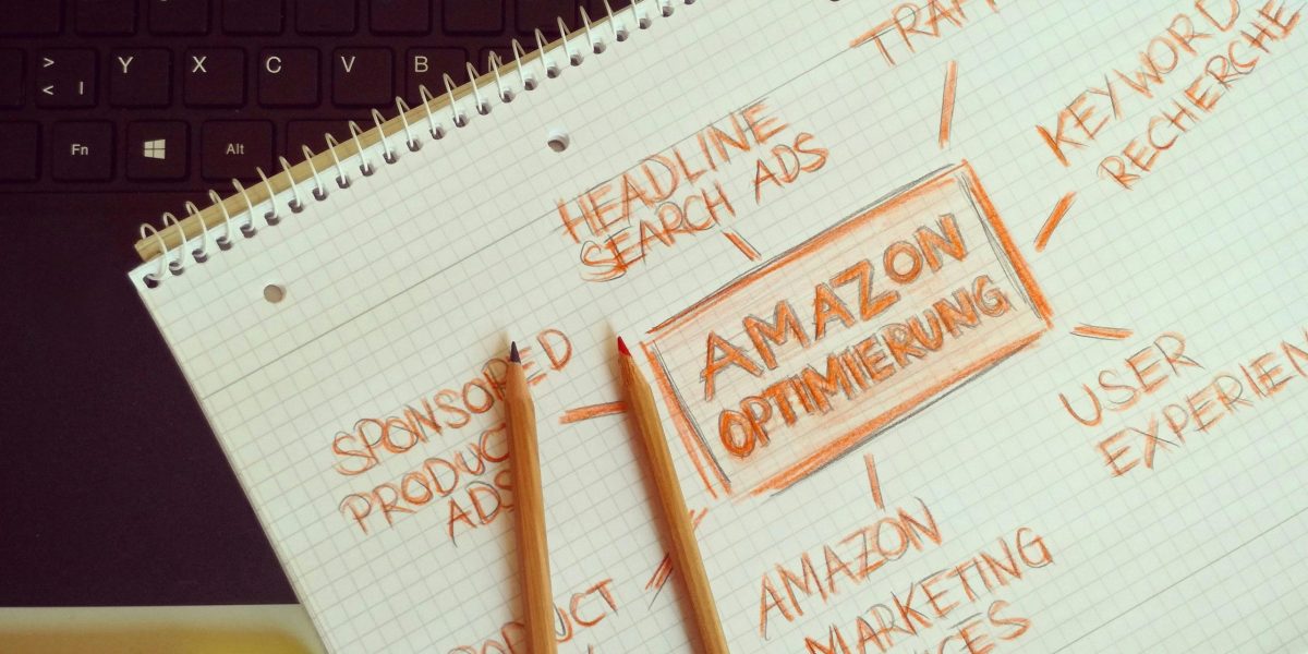 Visual representation of Amazon optimization techniques with handwritten notes and pencils.